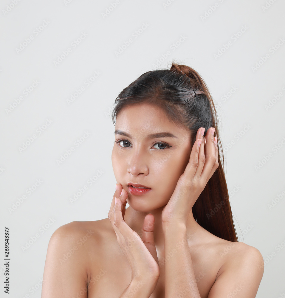 Beautiful Young Asian Woman with Clean Fresh Skin look away .Girl beauty face care. Facial treatment . Beautiful Young Asian Woman with Clean Fresh Skin look away .Girl beauty face care. Facial treatment .