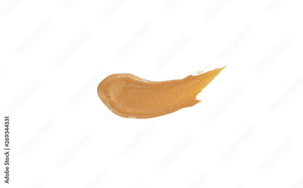 smeared spot of a beige corrector (tonal basis) is isolated on a white background. smeared spot of a beige corrector (tonal basis) is isolated on a white background.