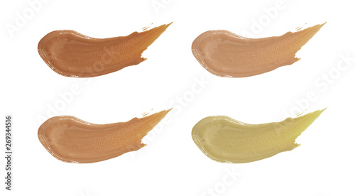 Cosmetic product. A collection of four shades of beige smeared spot of corrector (tonal framework)