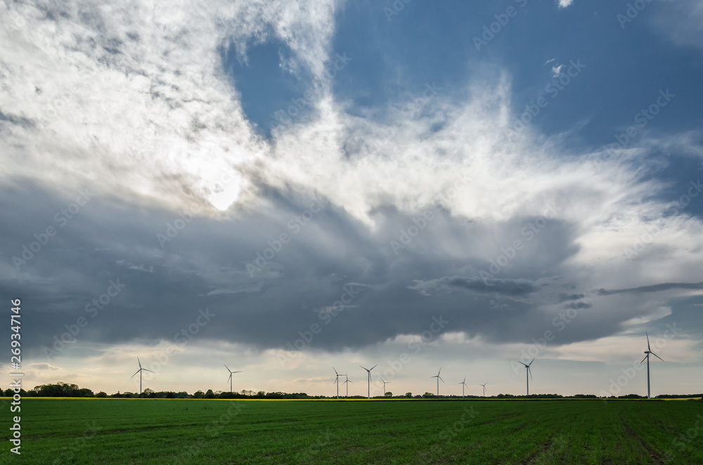 CLOUDS IN THE SKY - Stormy weather over green fields CLOUDS IN THE SKY - Stormy weather over green fields