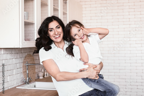 Happy mother with daughter ...