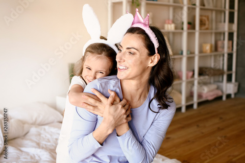 Happy mother and daughter h...