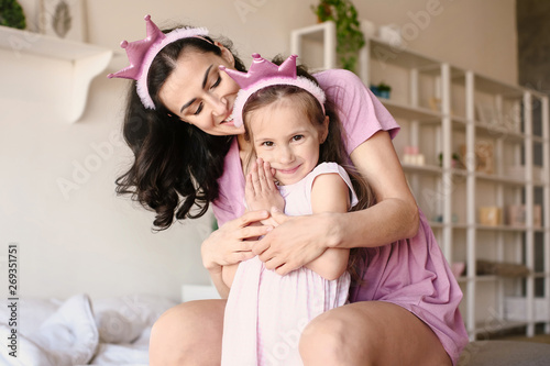 Happy mother and daughter h...
