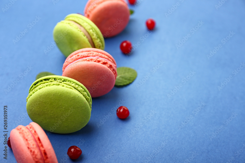 Tasty macarons on color background Tasty macarons on color background
