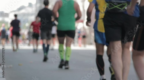 Marathon Runners Crowd Bottom-view Legs. Athletes Runing Out Off Focuss. Blurred Runner Feet Running Marathon.  Tet Riga Marathon Latvia 