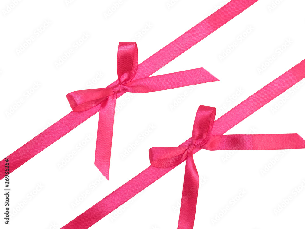 Two pink satin ribbon diagonally with bows on white background
