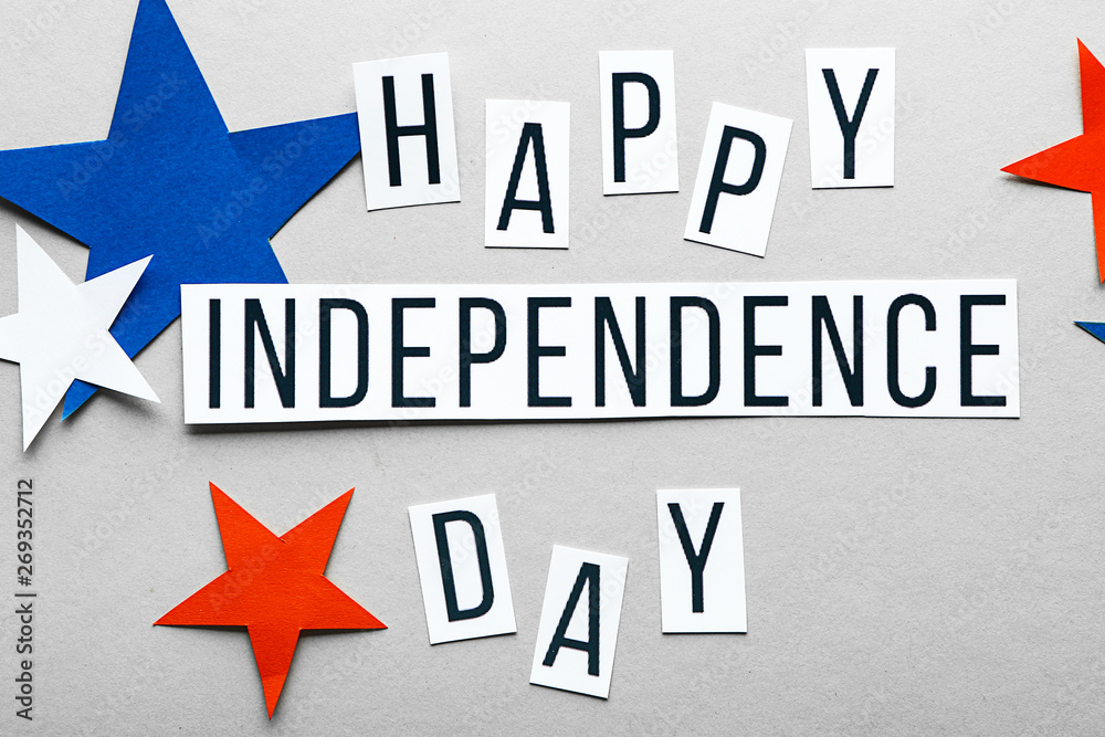 Text HAPPY INDEPENDENCE DAY and stars on grey background Text HAPPY INDEPENDENCE DAY and stars on grey background