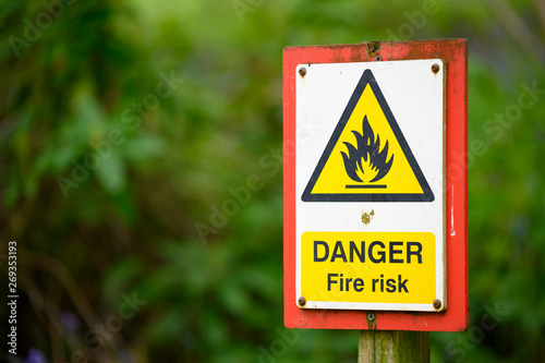 Danger Fire Risk sign on a post in the forest