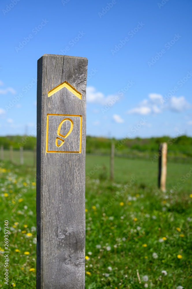 Wooden signposts for footpath and walkway