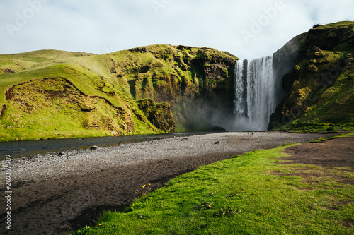 Amazing view of popular tourist attraction. Location famous Skogafoss waterfall  Skoga river  Iceland  Europe.