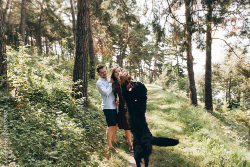 Portrait of a happy family with a dog © Катерина Дудар