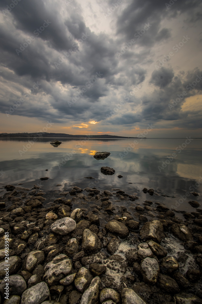Beautiful sunset with reflections over the lake. Beautiful sunset with reflections over the lake.