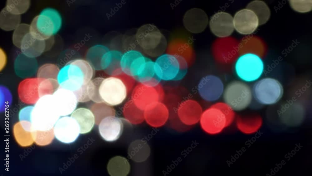 Blurred traffic jam view. Rush hour, city blurred background, bokeh. Blurred traffic jam view. Rush hour, city blurred background, bokeh.