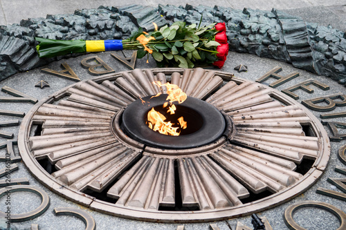 Bouquet of roses near the Eternal fire on the Tomb of the Unknown Soldier in Kyiv, Ukraine, 09 May 2019.
