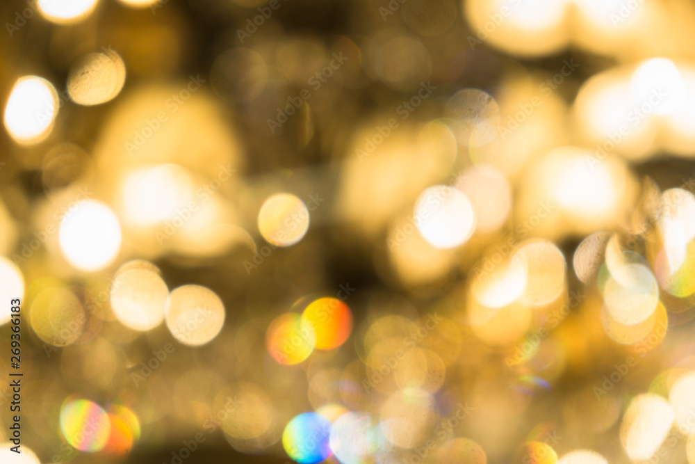 Blurred abstract background of Christmas lights.Brightly glowing yellow-orange balls and lines.Abstract color patterns Blurred abstract background of Christmas lights.Brightly glowing yellow-orange balls and lines.Abstract color patterns