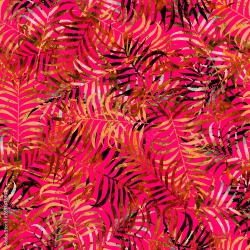 tropical leaves with textures of yellow and brown colors over a pink color