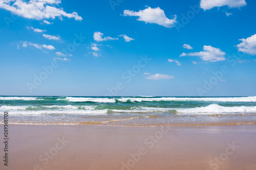 Beautiful beach and tropical sea and blue sky