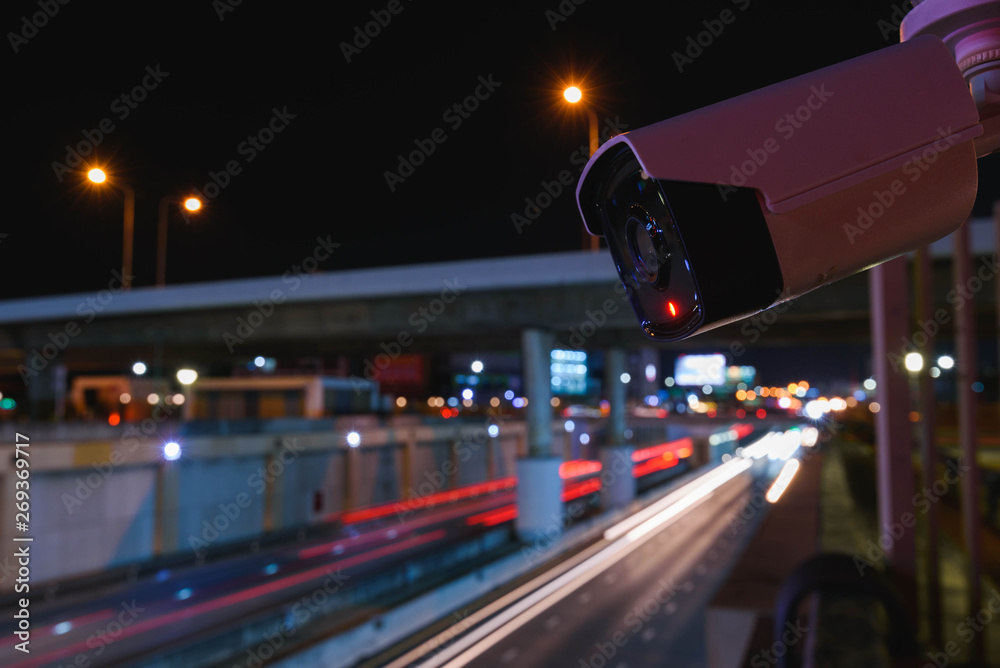 Fototapeta premium CCTV surveillance camera operating on traffic road
