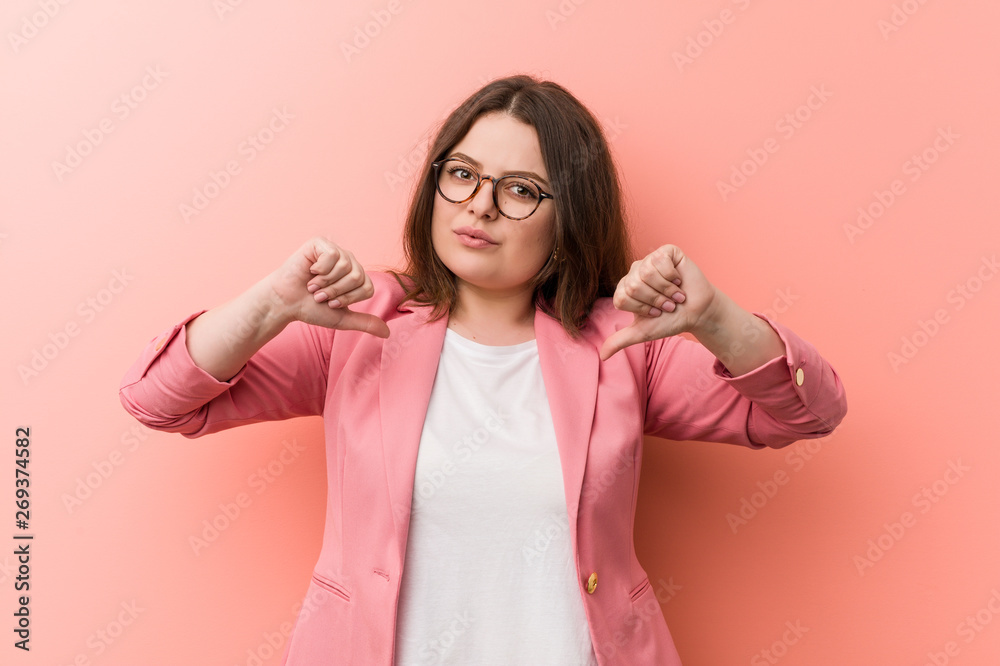 Young plus size business caucasian woman feels proud and self confident, example to follow. Young plus size business caucasian woman feels proud and self confident, example to follow.