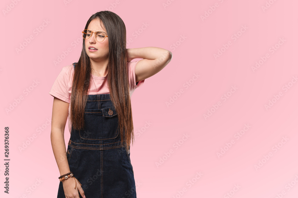 Young cool woman suffering neck pain Young cool woman suffering neck pain