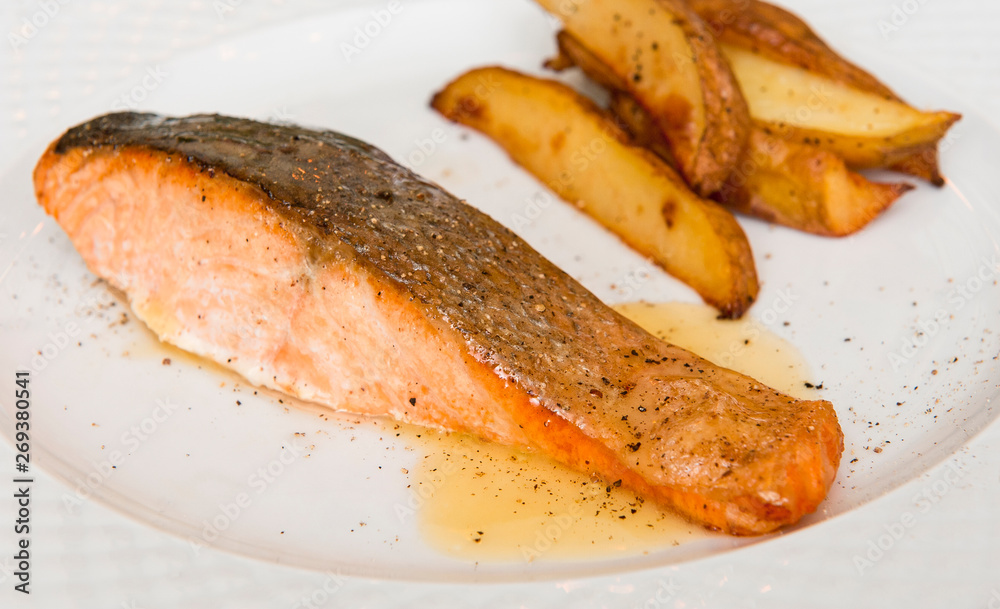 Prepared salmon on the white plate Prepared salmon on the white plate