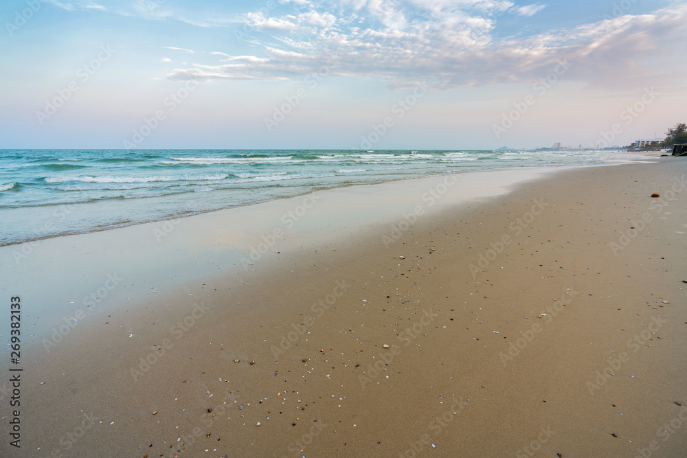 Beautiful Tropical Beach Hua Hin, Prachuap Khiri Khan Province, Thailand. blue ocean background Summer view Sunshine at Sand and Sea Asia Beach Destinations 