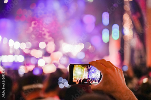 Foto Close up of recording video with smartphone during a concert