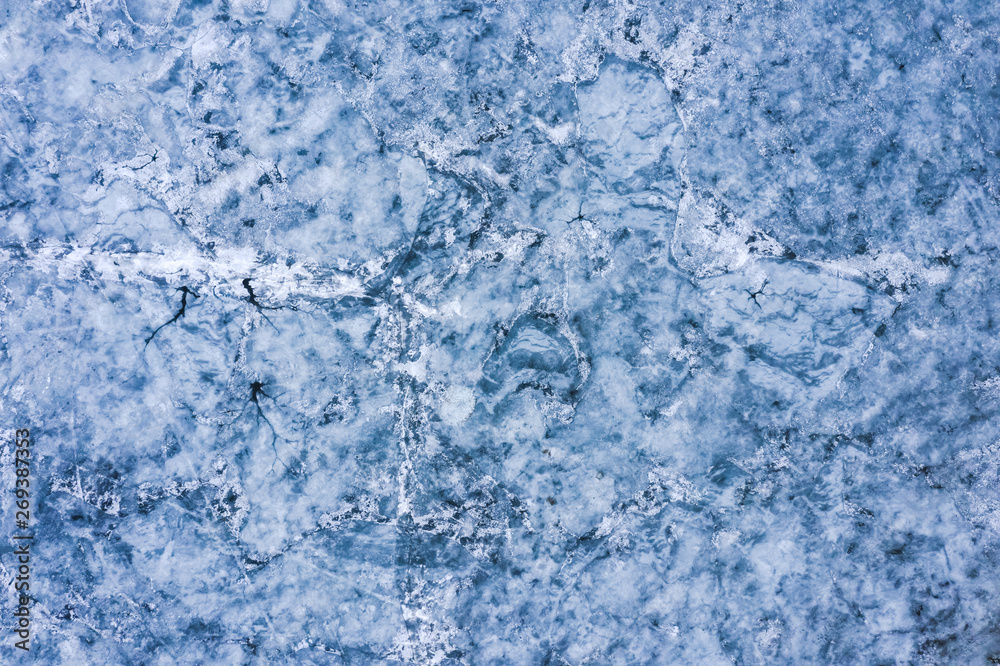 Aerial view of frozen lake. Drone view. Background texture concept. Aerial view of frozen lake. Drone view. Background texture concept.