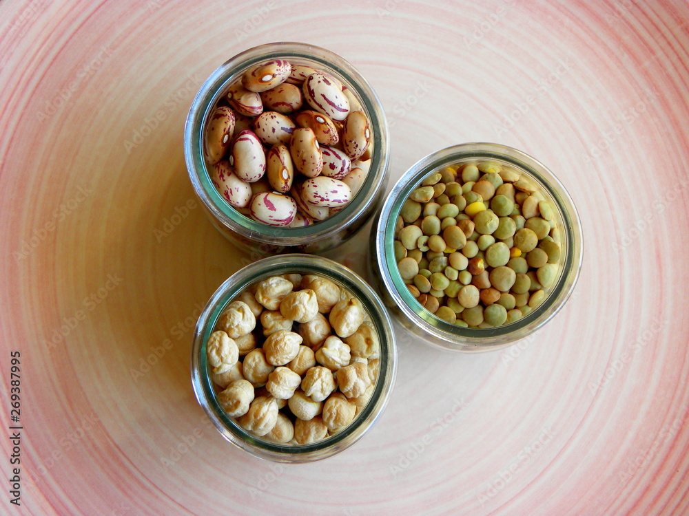 lentils, chickpeas, beans in glass jars lentils, chickpeas, beans in glass jars