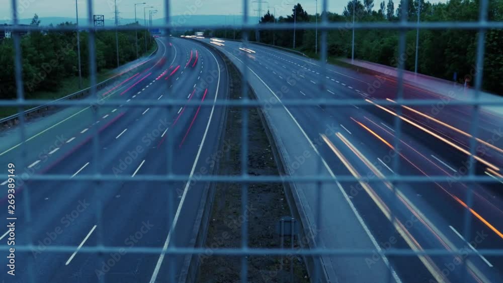 Busy road traffic infrastructure of Dublin Ireland in the evening, time lapse shot Busy road traffic infrastructure of Dublin Ireland in the evening, time lapse shot