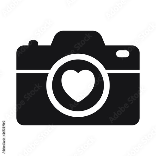 Camera with heart on white background icon