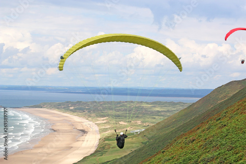 Paraglider flying at Rhossili