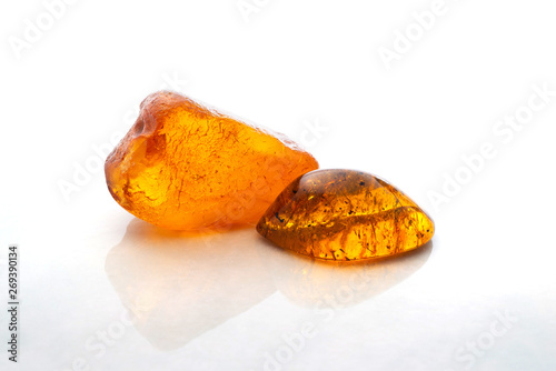 Two red yellow amber stone piece photo