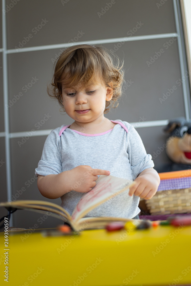 toddler girl drawing with crayons on paper toddler girl drawing with crayons on paper