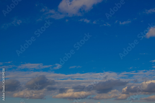 Beautiful photo of clouds in the blue sky, A flock of little clouds © Игорь Глущенко