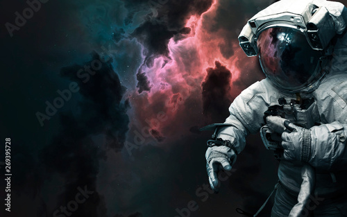 Fototapeta Naklejka Na Ścianę i Meble -  Astronaut in front of deep space landscape. Elements of this image furnished by NASA