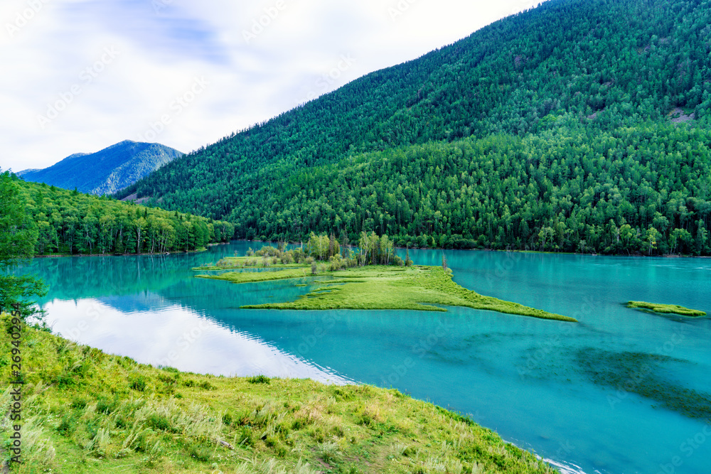 Beautiful mountain lake water in Wolong Bay, Kanas Lake, Xinjiang, China