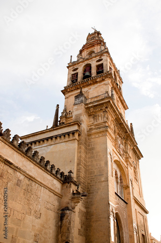 iluminated tower in cordoba mosque from down to the sky in Spain
