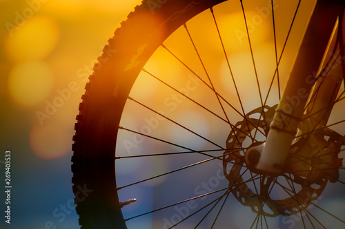 Mountain Bike Front Wheel with Warm Background