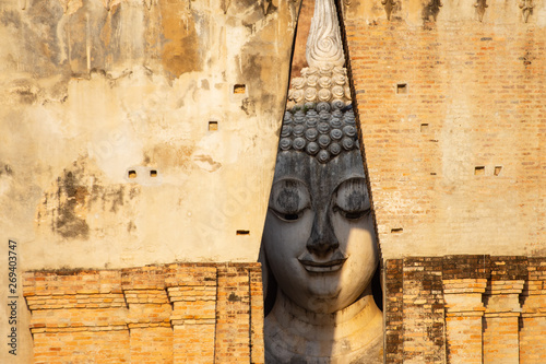 Wat Si Chum(Phra Achana) Sukhothai Historical Park in Thailand.. photo