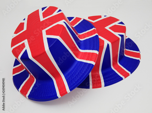 two top hats painted with the british union jack flag colours of red white and blue brexit  photo