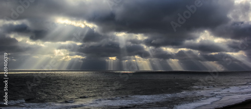 Sunbeams over ocean