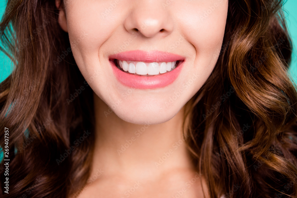 Cropped close-up view portrait of nice-looking healthy perfect white cheerful cheery smiling wavy-haired girl isolated over bright vivid shine blue background Cropped close-up view portrait of nice-looking healthy perfect white cheerful cheery smiling wavy-haired girl isolated over bright vivid shine blue background