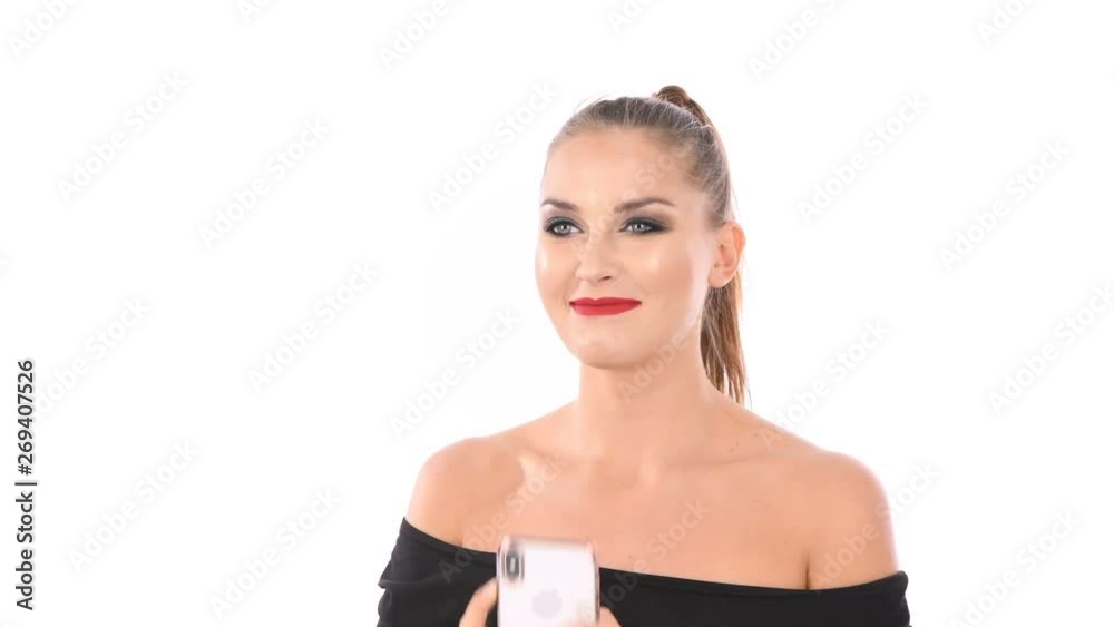 Portrait of a happy caucasian woman using mobile phone isolated over white background Portrait of a happy caucasian woman using mobile phone isolated over white background