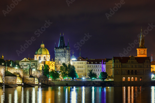 .Night view of the Vltava River and Charles Bridge in the city of Prague. Czech Republic.