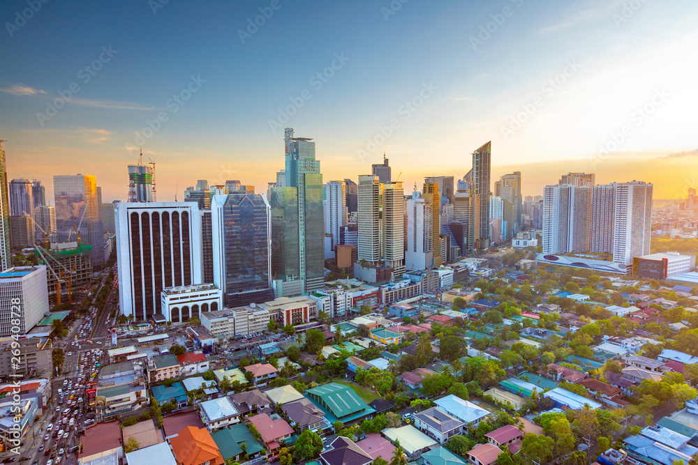 Elevated, sunset view of Makati, the business district of Metro Manila, Philippines