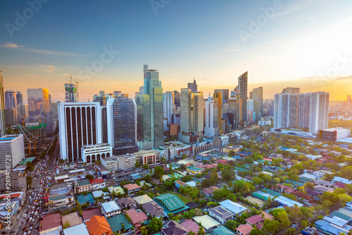Elevated, sunset view of Makati, the business district of Metro Manila,  Philippines photo