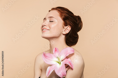Pretty young redhead woman ...