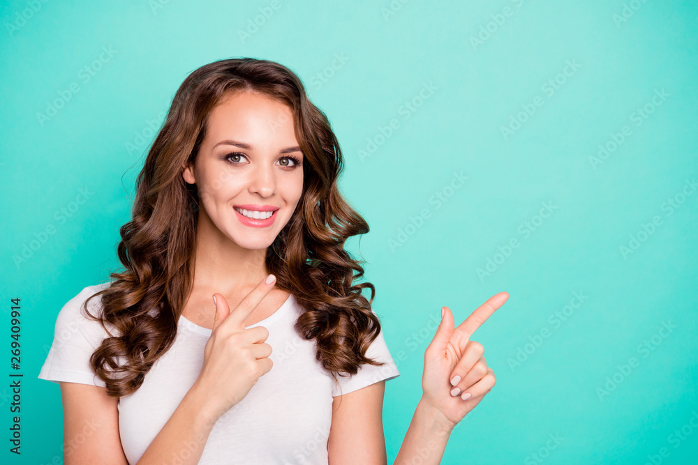Close-up portrait of her she nice attractive lovely winsome gorgeous confident cheerful wavy-haired lady pointing two forefingers aside ad isolated on bright vivid shine blue background Close-up portrait of her she nice attractive lovely winsome gorgeous confident cheerful wavy-haired lady pointing two forefingers aside ad isolated on bright vivid shine blue background