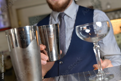 waiter pouring champagne in a glass